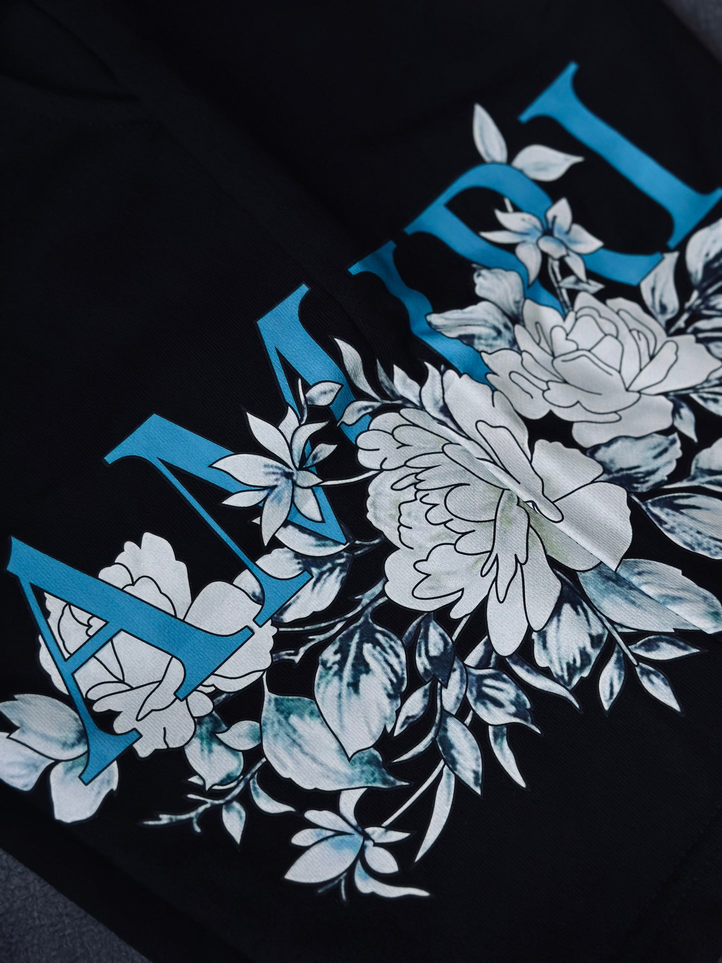 PANTALONETA AMI NEGRA AMI AZUL FLORES
