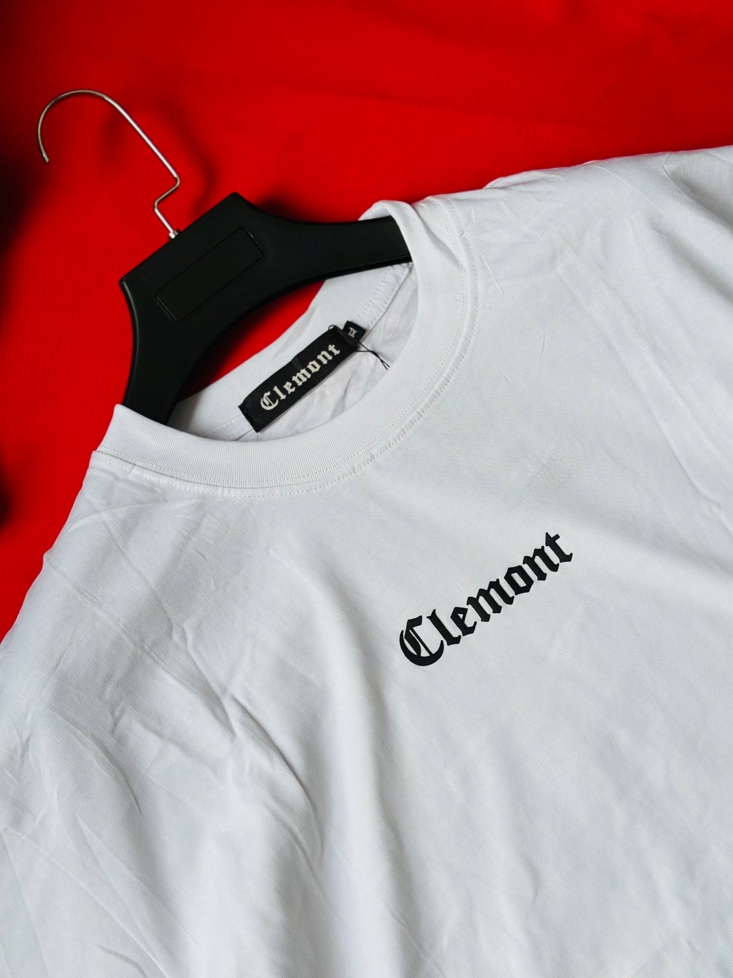CAMISETA OVERSIZE CLE BLANCA DETALLE DORADO