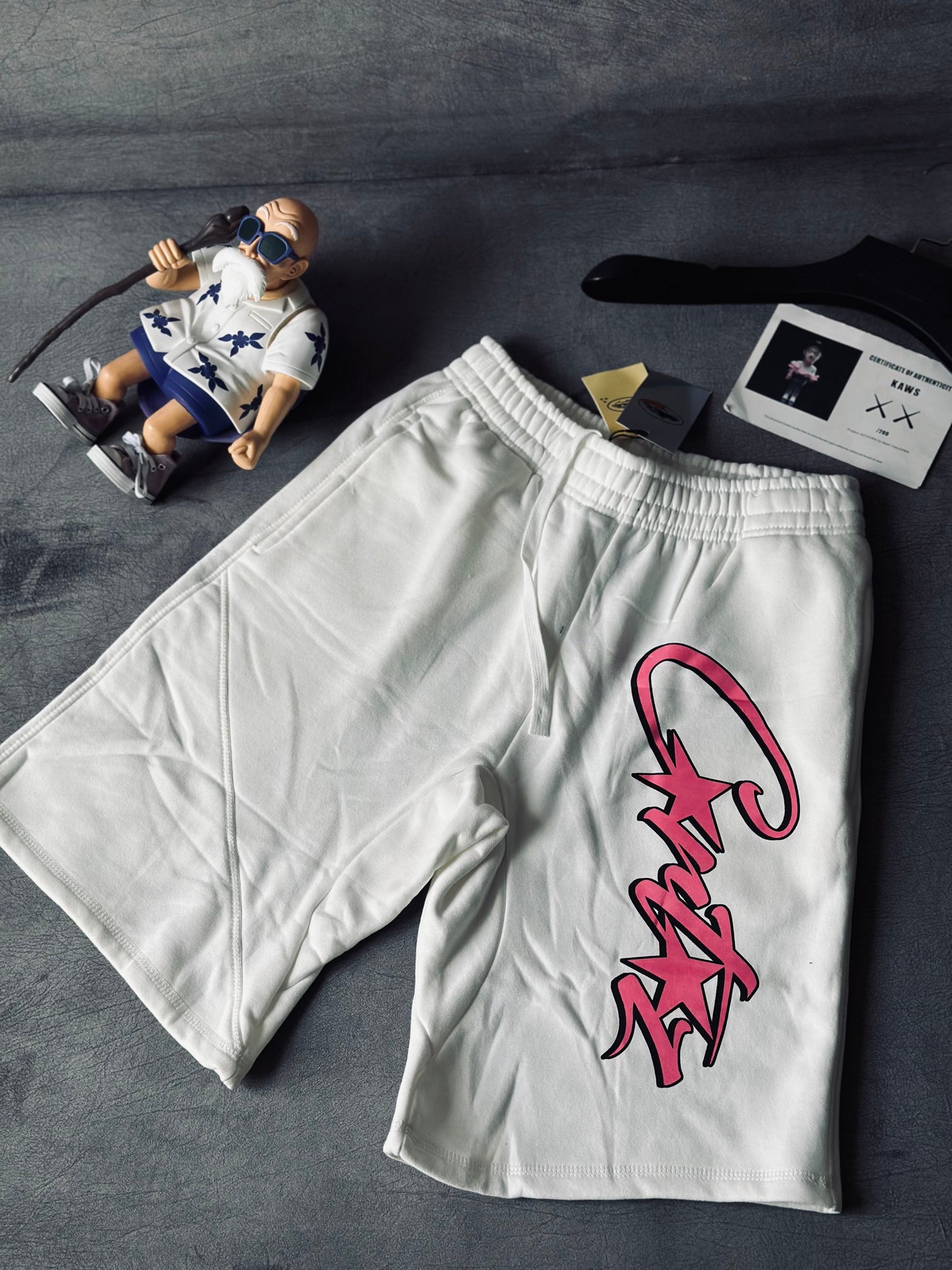 PANTALONETA COR BLANCA DETALLE ROSADO