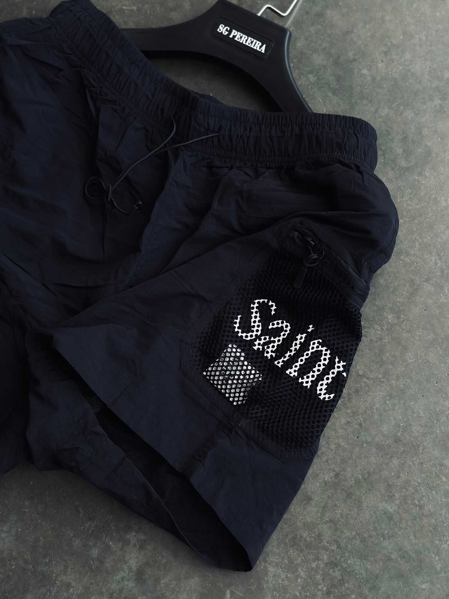 PANTALONETA SAI NEGRA BOLSILLO MALLA