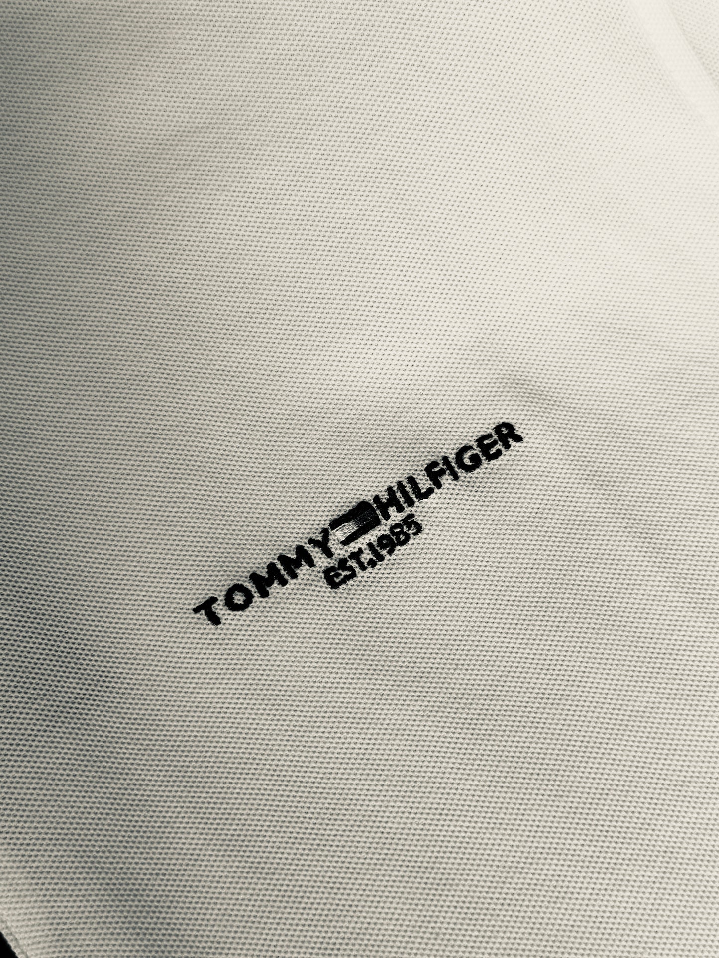 CAMISETA POLO TOM BLANCA CREMALLERA NEGRA