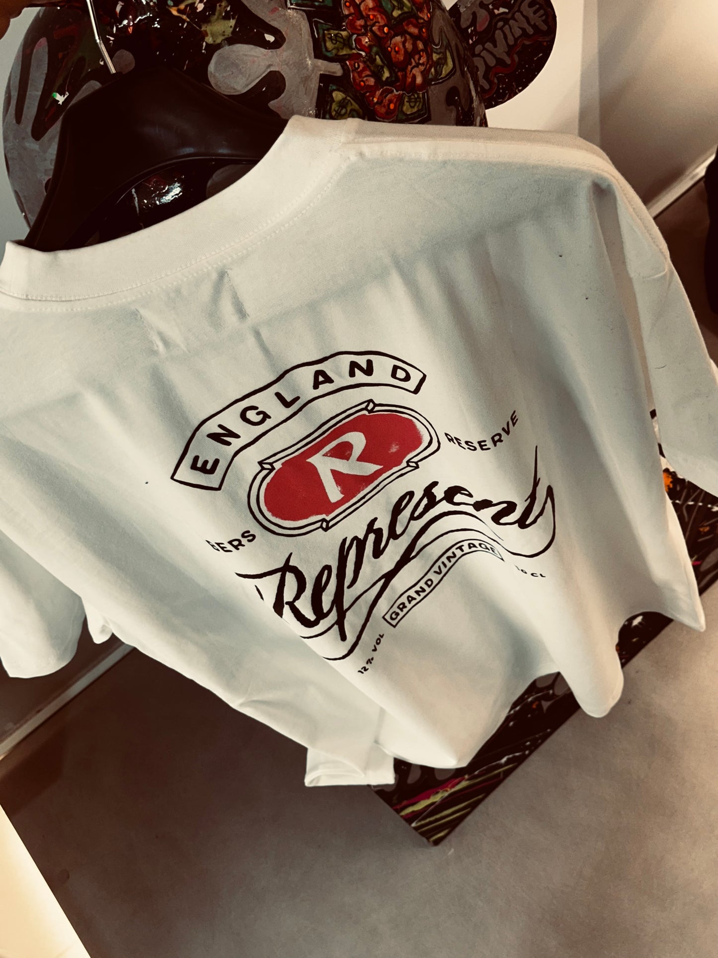 CAMISETA OVERSIZE REP BLANCA "R" ROSADA
