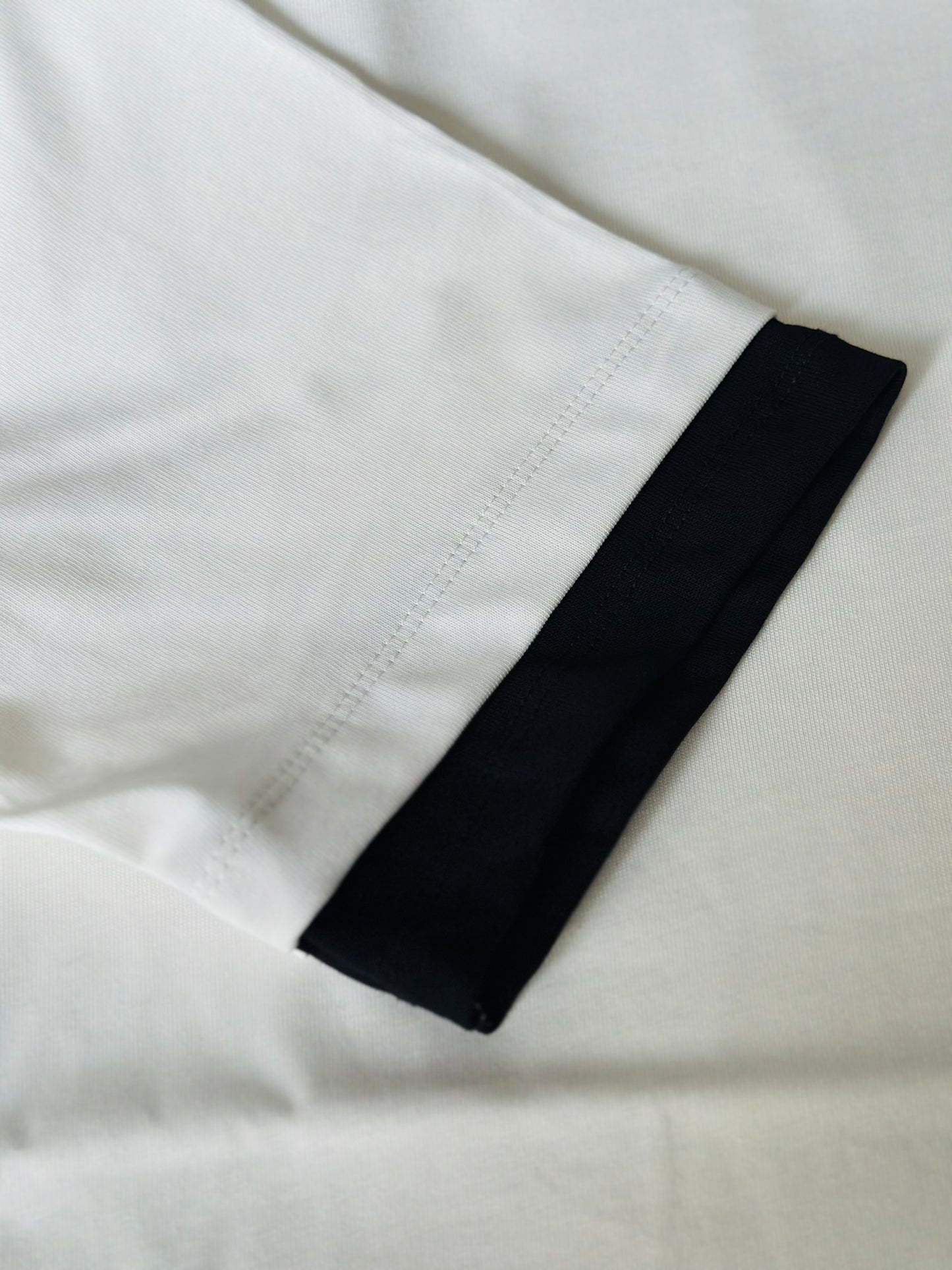 CAMISETA OVERSIZE TC PRA BLANCA DOBLE COSTURA NEGRA