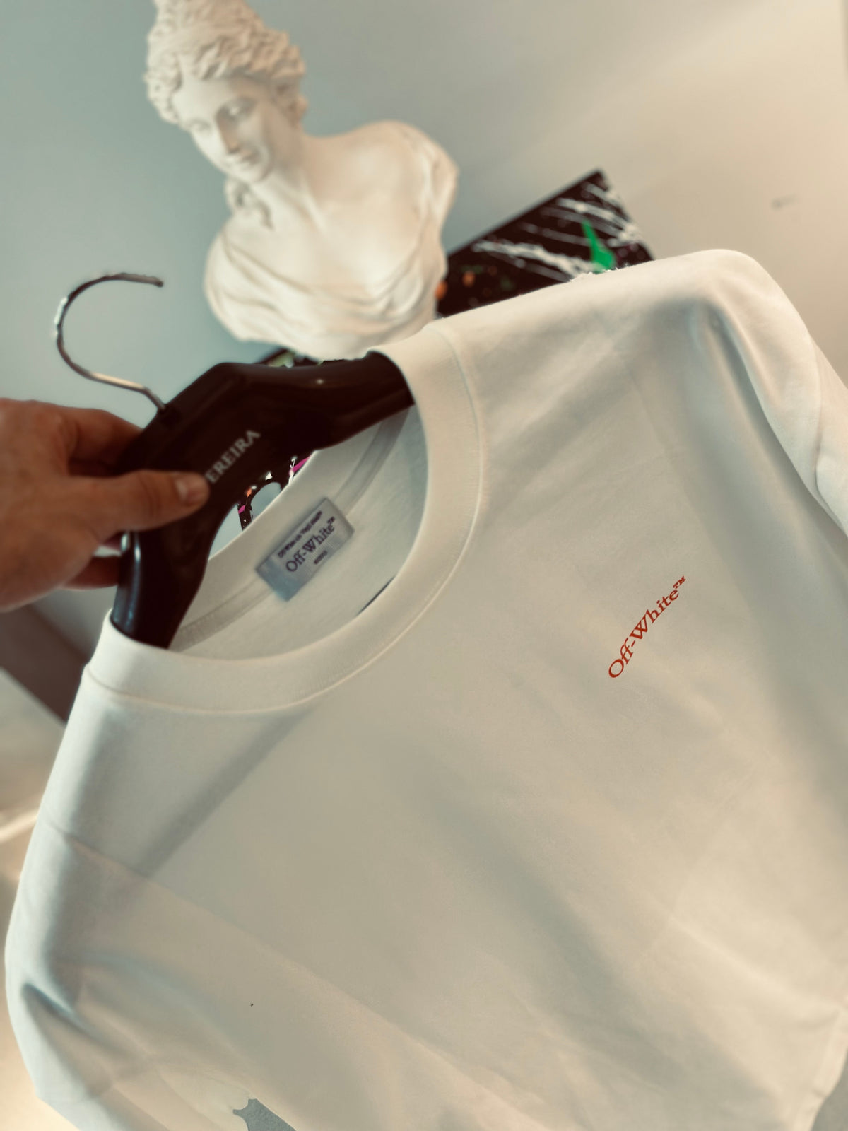 CAMISETA OVERSIZE OFF BLANCA "X" METRO NARANJA