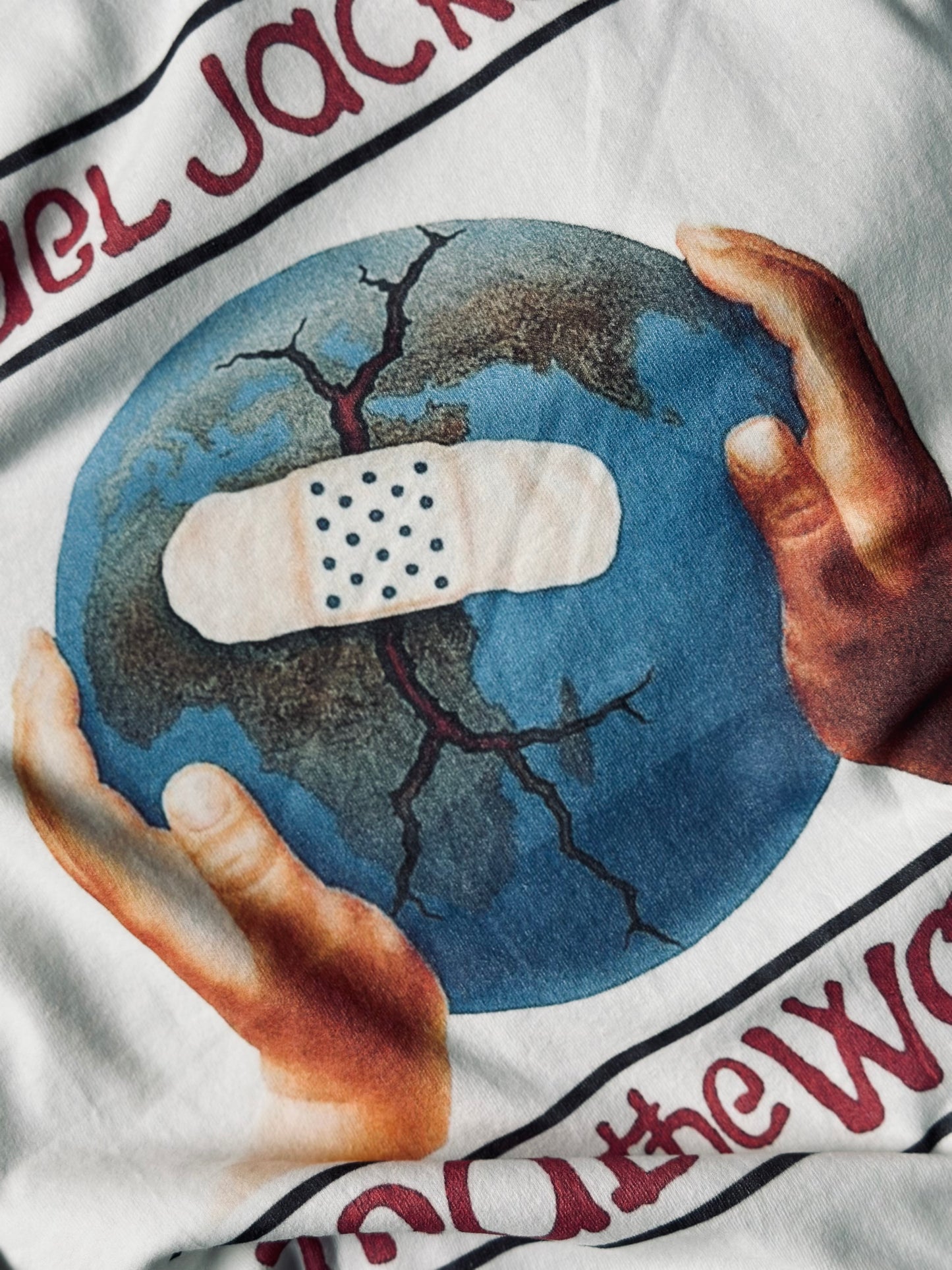 CAMISETA OVERSIZE SAI BLANCA PLANETA CURA