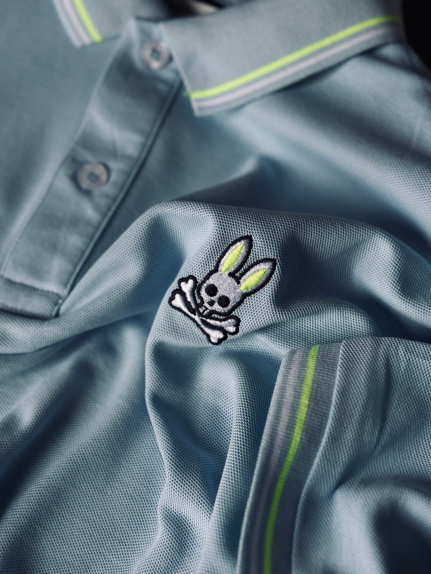 CAMISETA POLO PSY AZUL TEJIDO BLANCO VERDE