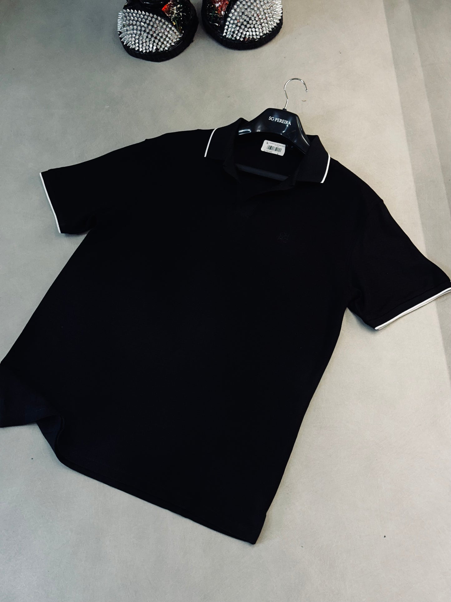 CAMISETA POLO CAR NEGRA BASICA CH TEJIDO