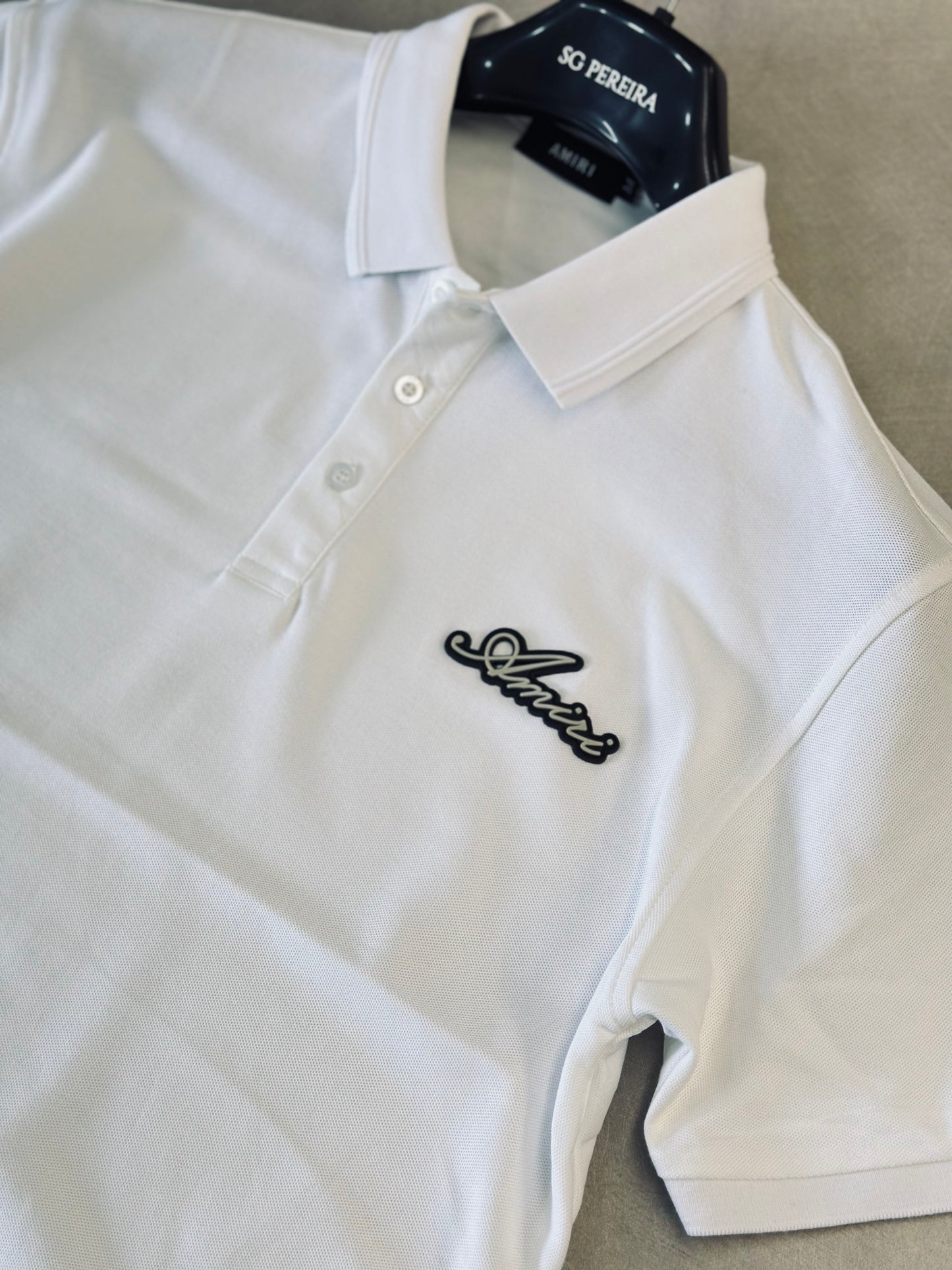 CAMISETA POLO AMI BLANCA AMI ENGOMADO