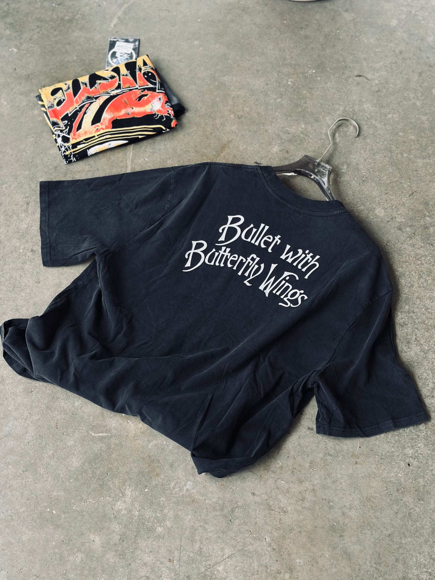 CAMISETA OVERSIZE SAI GRIS ROSTRO ROTO
