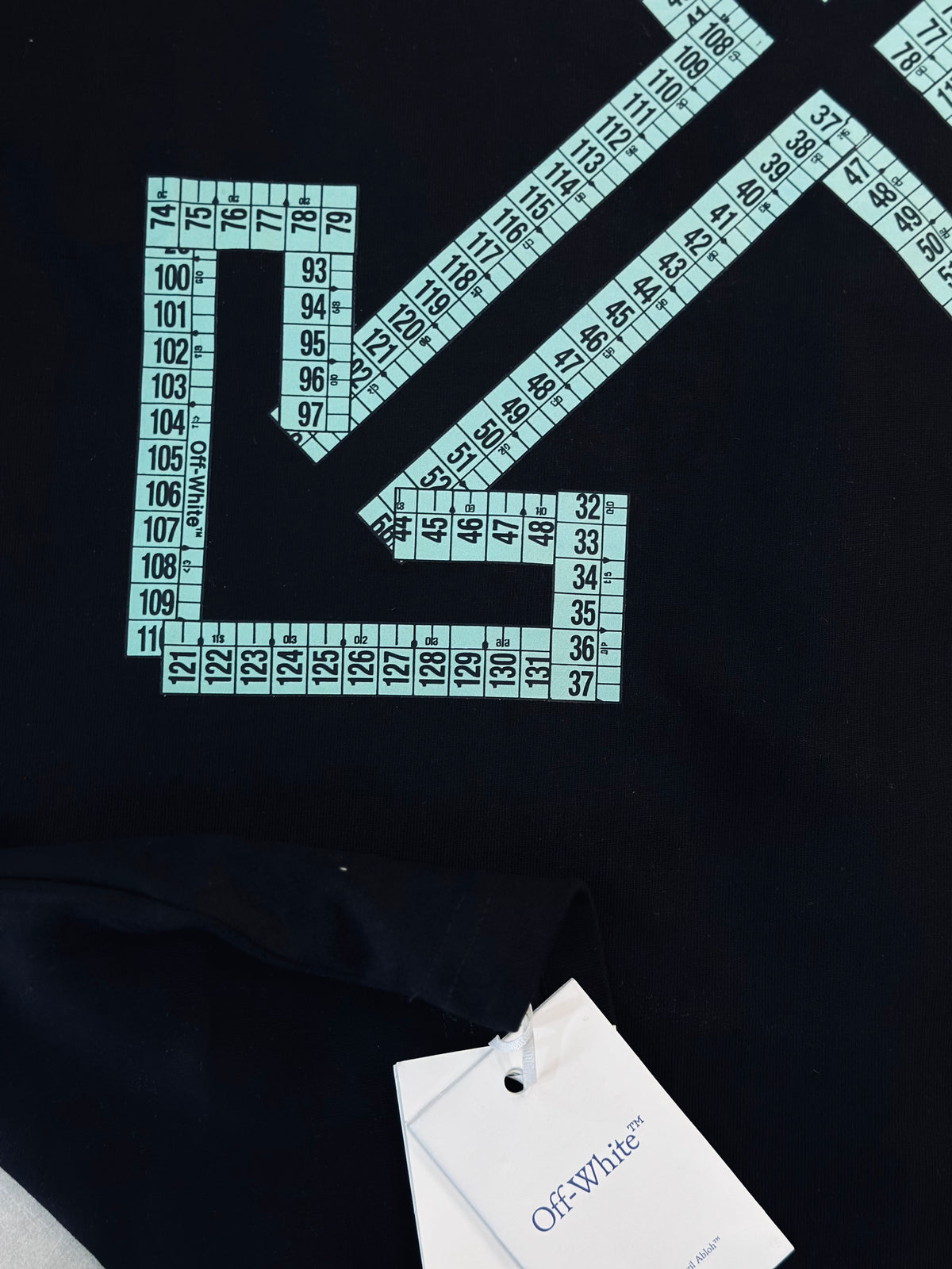 CAMISETA OVERSIZE OFF NEGRA "X" METRO VERDE