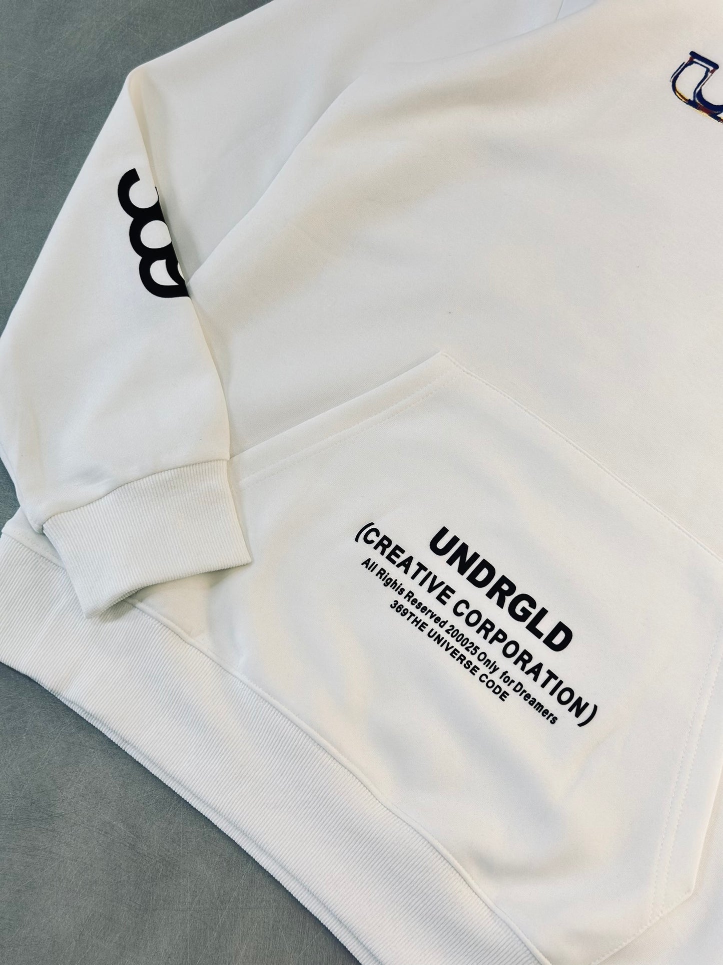 HOODIE UND BLANCO ESFERA TRASERA