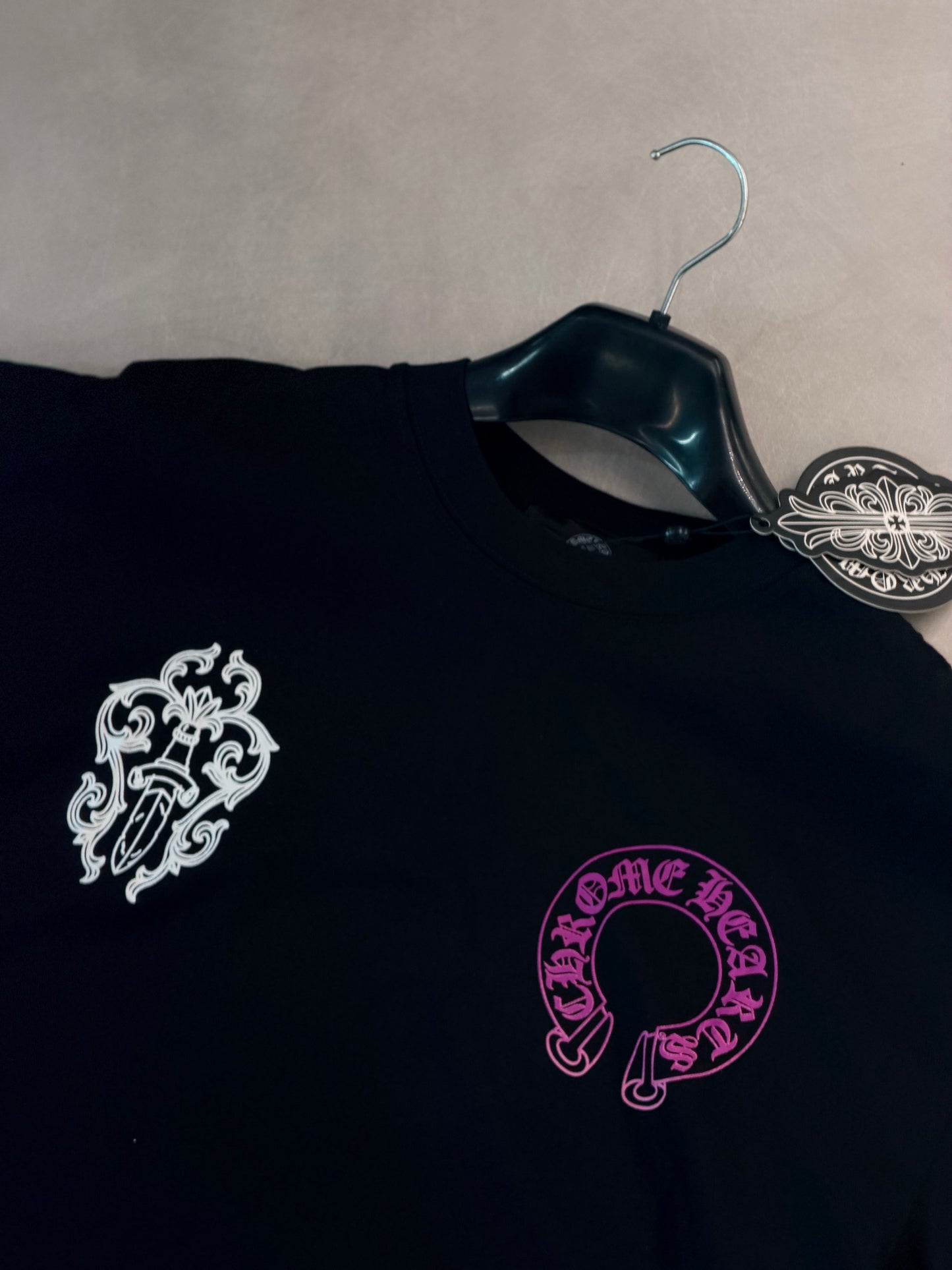 CAMISETA OVERSIZE CHR NEGRA ESPADA