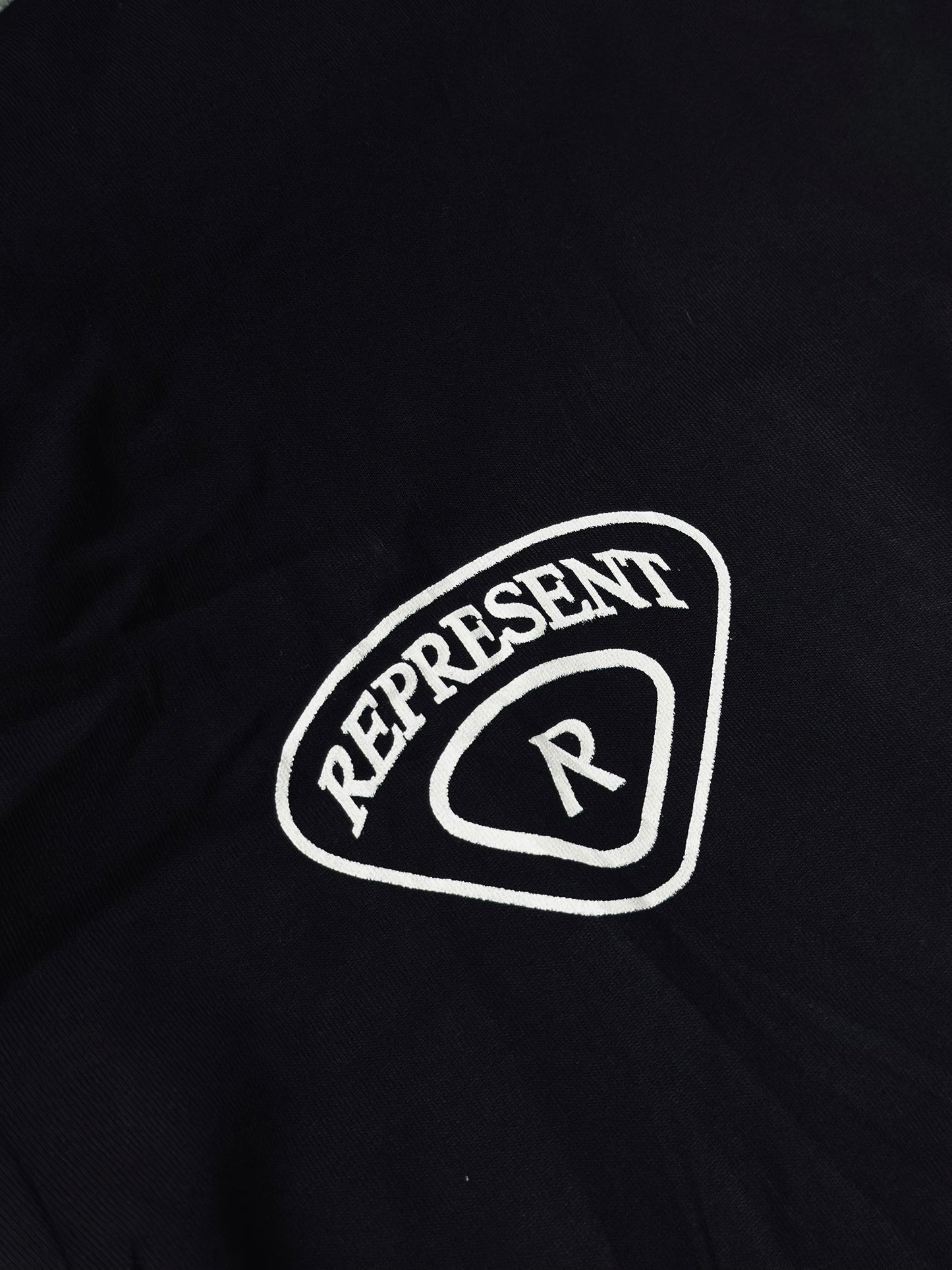 CAMISETA OVERSIZE REP NEGRA TEAM CHAMPION