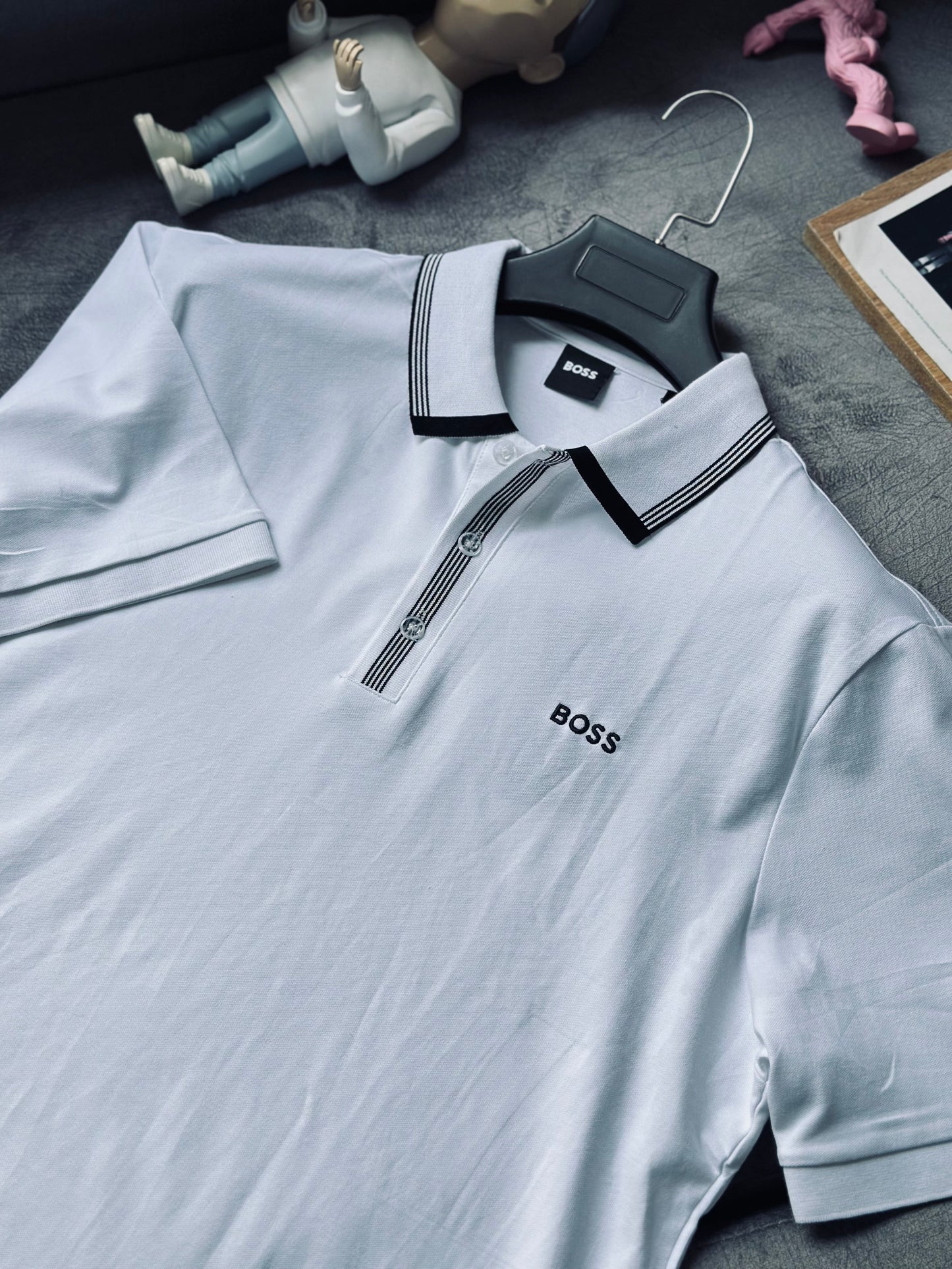 CAMISETA POLO HUG BLANCA DETALLES NEGROS