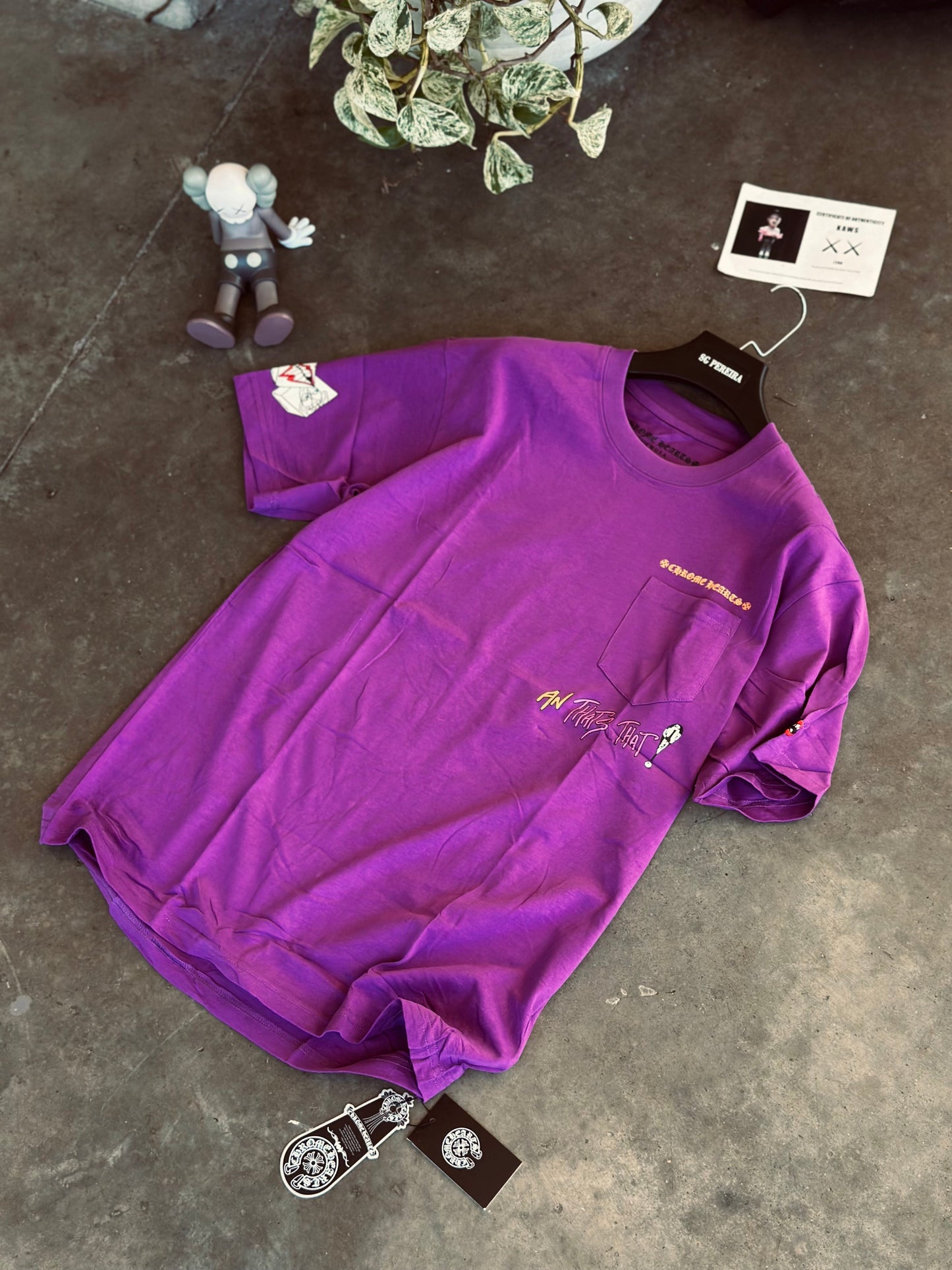 CAMISETA OVERSIZE CHR MORADA LETRA NARANJA