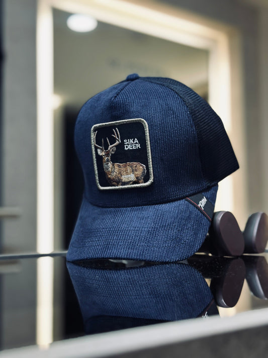 GORRA GOO AZUL OSCURO GAMUSA CIERVO